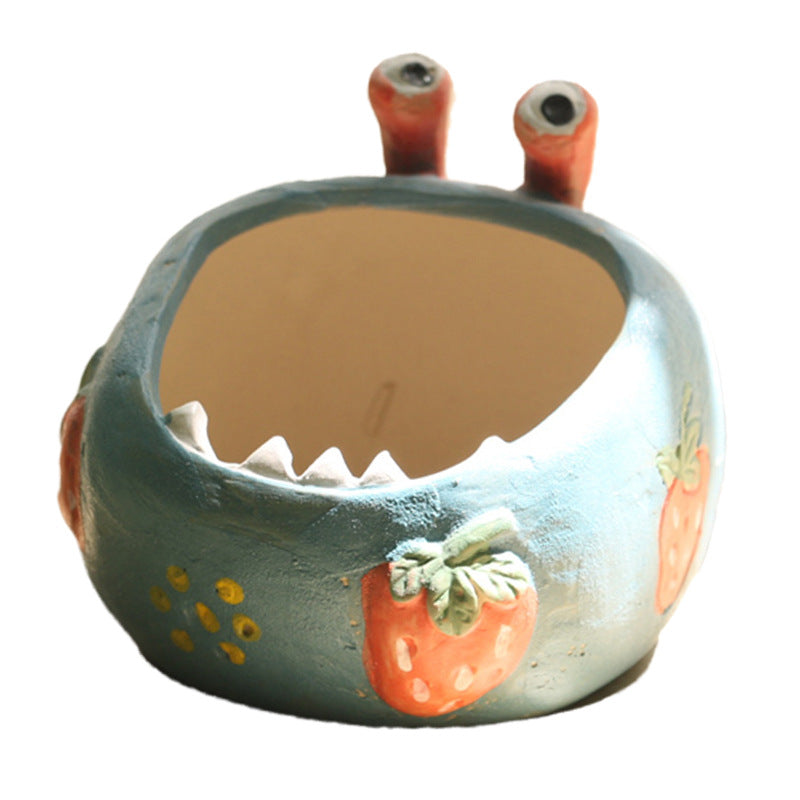 A large-eyed monster coarse clay hand-painted breathable succulent flowerpot